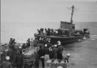 SC-705 receiving tow line from PF-69 at 1035 hrs on 02 Aug 1945